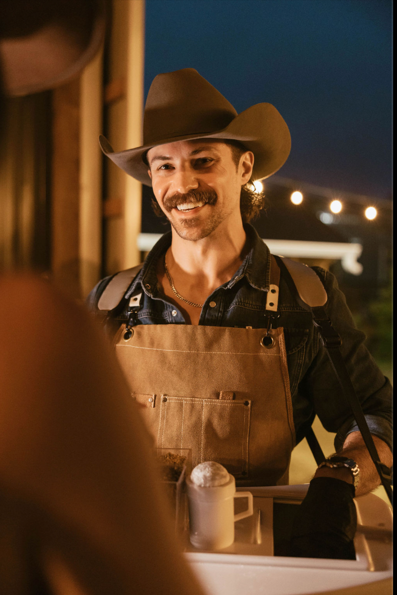 The Cowboy Cannoli serving guests at golden hour
